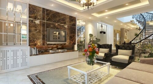 Hình ảnh phòng khách nhà lô 3 tầng với đá cẩm thạch ốp tường sau tivi, tủ gương kính, ghế bành màu đen