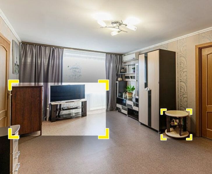 Hình ảnh toàn cảnh phòng khách căn hộ nhỏ sử dụng tông màu trắng, xám chủ đạo