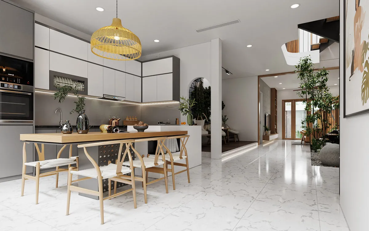 Không gian bếp chữ L hiện đại màu xám trắng liền kề bàn ăn gỗ lớn