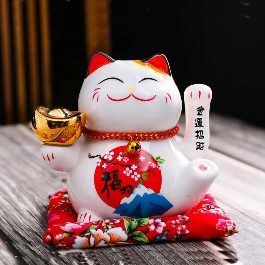 Mèo Thần Tài vẫy tay phải mang ý nghĩa thu hút phúc khí và may mắn cho gia chủ.