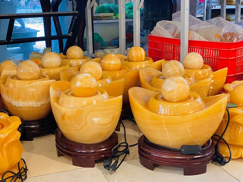 Phong thủy luân đá ngọc hoàng long hình Đĩnh Kim Ngân tượng trưng cho sự sung túc và thu hút của cải